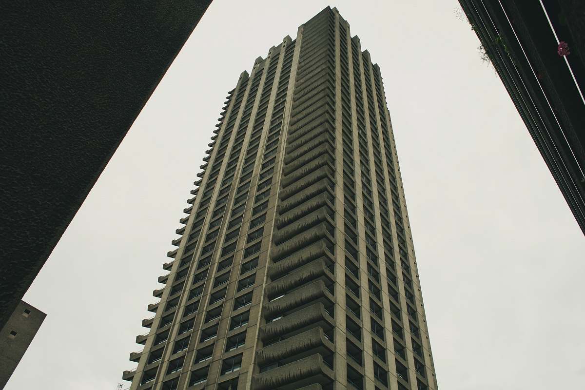 office building grey high rise building city